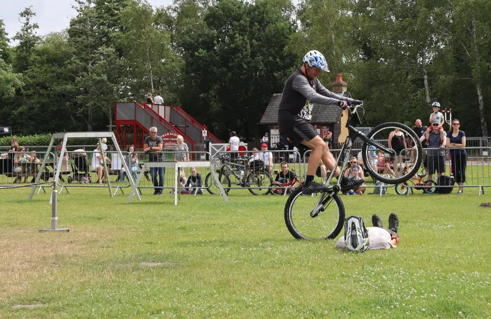 stunt riders performing tricks in an arena